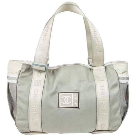 chanel grey canvas bag|Chanel nylon hand pochette bag.